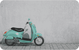 parked teal vespa